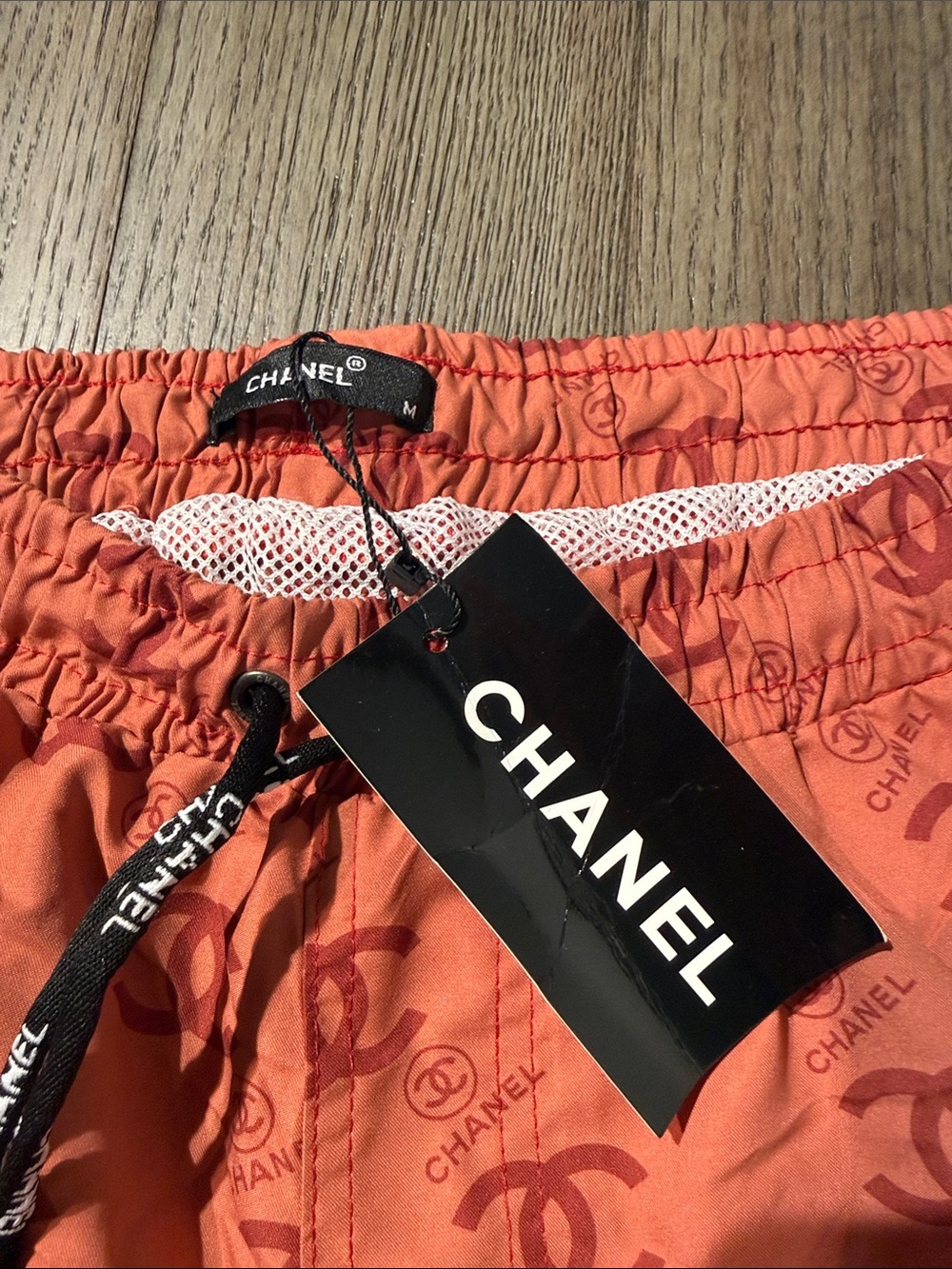 CHANEL Men’s Coral Logo Swim Trunks - Picture 3 of 5